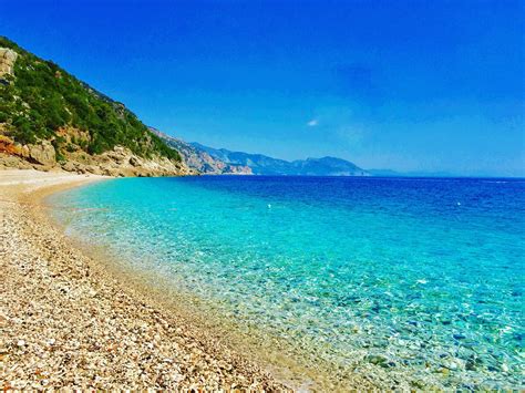 An empty Sardegna beach moments before a cruise ship turned up ...