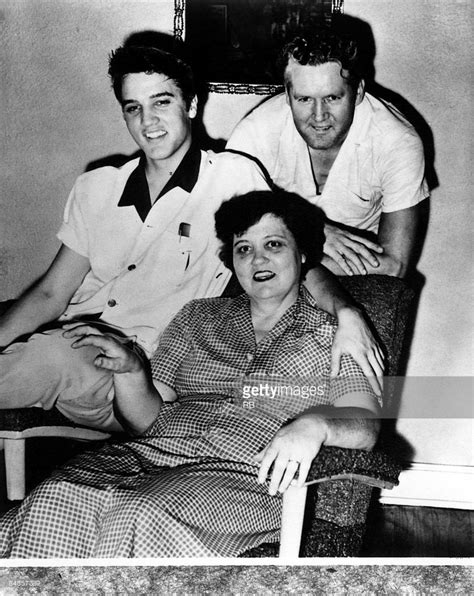 Photo of Elvis PRESLEY; Elvis Presley with his parents Gladys and ...