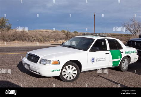 Border Patrol car on highway in Texas with U.S Customs and Border Protection logo on door Stock ...