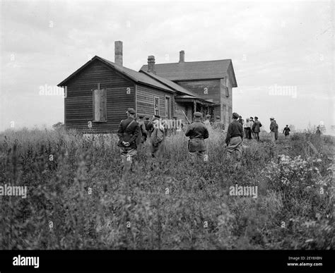 Indiana state police surround the house where two of the convicts were supposed to have been ...