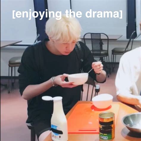 two people sitting at a table eating food with the caption enjoying the dramaal