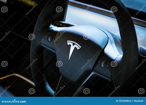 Tesla Logo On A Steering Wheel Editorial Image | CartoonDealer.com #252289864