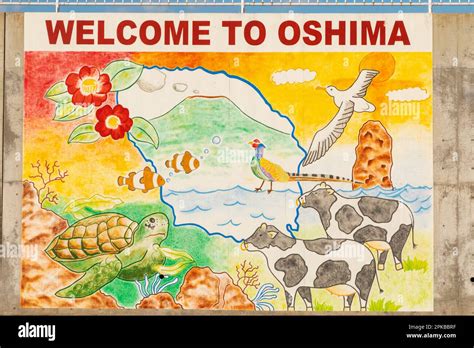 Japan, Honshu, Izu-Oshima Island, Welcome Sign depicting Local Attractions Stock Photo - Alamy