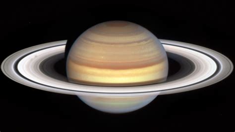 NASA Finds Mysterious Spokes Moving Along Saturn's Rings - CNET