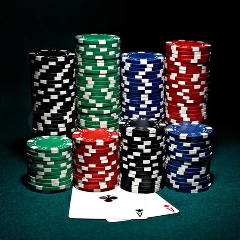 Stacks of chips for poker with pair of ... | Stock image | Colourbox