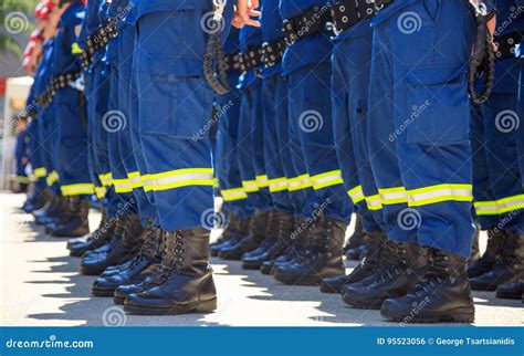 Firefighters in Their Uniforms Standing in Line Stock Photo - Image of clothes, occupation: 95523056