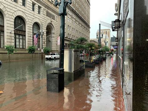 Photos show eerie scene as torrential rains flood New Orleans