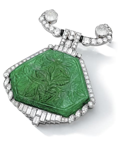 Art Deco Emerald and Diamond Brooch, Cartier, Circa 1925 Centring on a ...