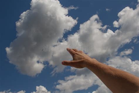 The Hand of an Invisible Man Reaches Out into the Sky in the Direction ...