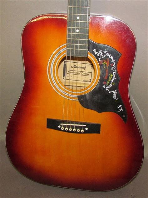 Sold Price: Harmony acoustic six string guitar - May 6, 0117 9:00 AM EDT