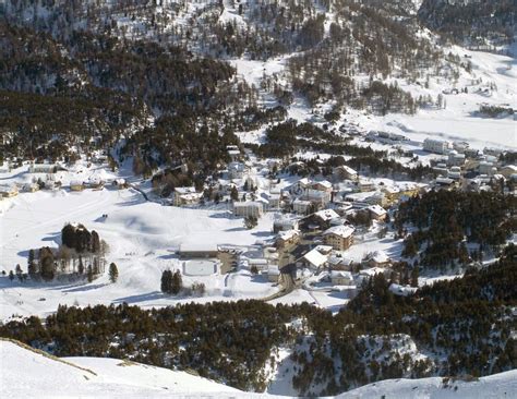 Snowy Swiss village stock photo. Image of cloud, beautiful - 4702268