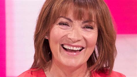 Lorraine Kelly stuns in a red floral skirt from Zara on the Lorraine show | HELLO!