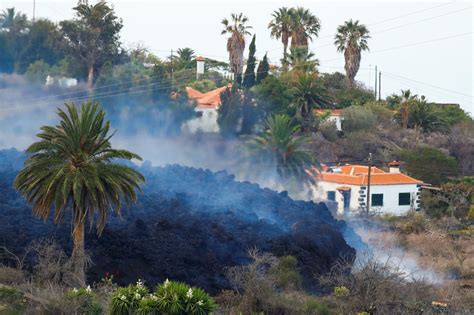 Lava from Canary Islands volcano flows to sea causing material damage ...