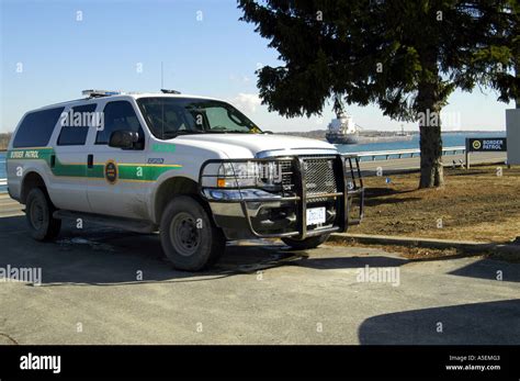 US Border Patrol SUV sitting near shore of St. Clair River, Ocean Stock ...