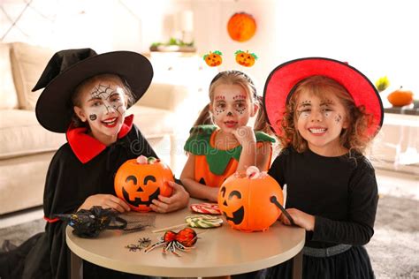 Cute Little Kids with Candy Buckets Wearing Halloween Costumes at Home Stock Image - Image of ...