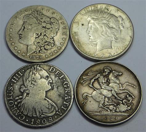 Lot - Four Very Rare Large Silver Coins