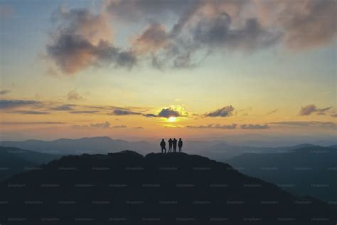 The couple standing on the beautiful sunset background photo – Blessed ...