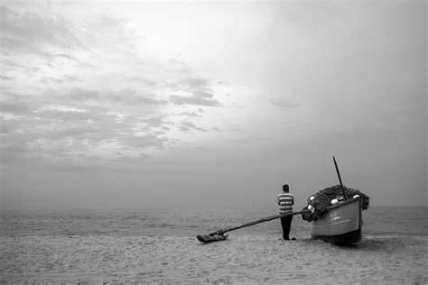 young man standing alone in the beach | In Batticaloa, kalla… | Flickr