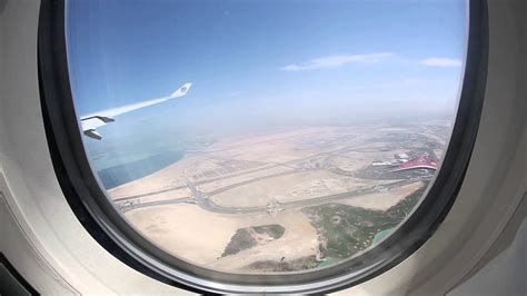 View from plane window Abu Dhabi airport and Ferrari World Abu Dhabi Theme Park - YouTube