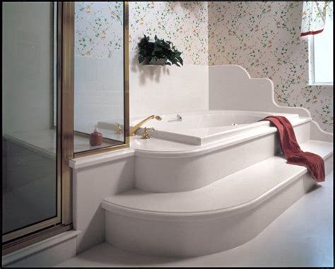 Tub detailing done in Corian® Cameo White | Corian, Corian bathroom, Corner bathtub