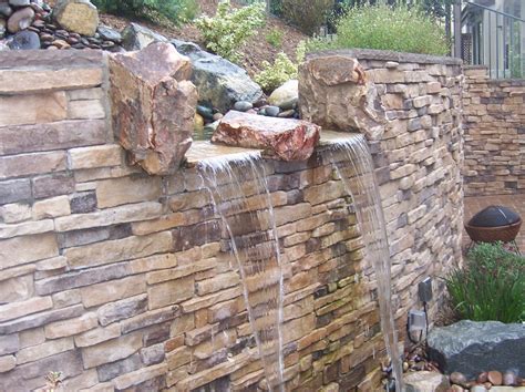 The 2 Minute Gardener: Photo - Water Feature on a Retaining Wall