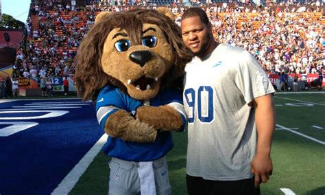 Detroit Lions 345 15: Detroit Lions mascot Roary and Suh at the Pro Bowl