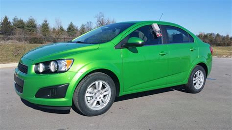 2015 CHEVROLET SONIC LT SEDAN DRAGON GREEN METALLIC $18,595.00 MSRP ...