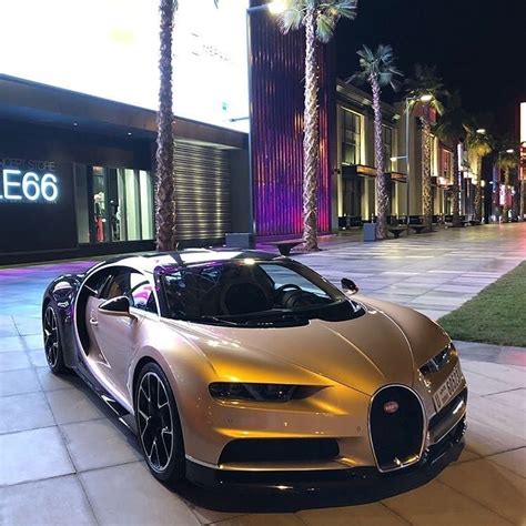 Bugatti Chiron This golden bug comes from #Dubai. Feeling the color? # ...