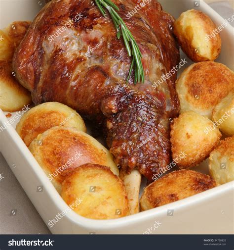 Roasted Leg Of Lamb With Roast Potatoes Stock Photo 34758832 : Shutterstock