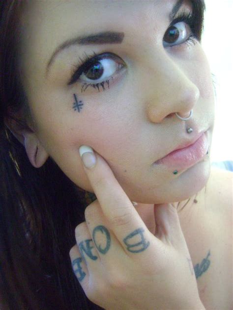 Simple Small Cross Tattoos On Face