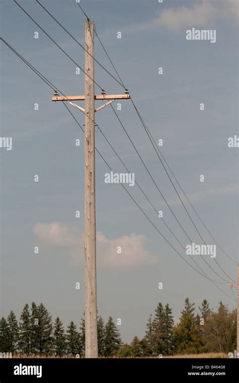 Wooden wood poles power lines hi-res stock photography and images - Alamy