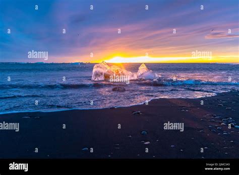 Sunrise at the beautiful diamond beach in Iceland Stock Photo - Alamy