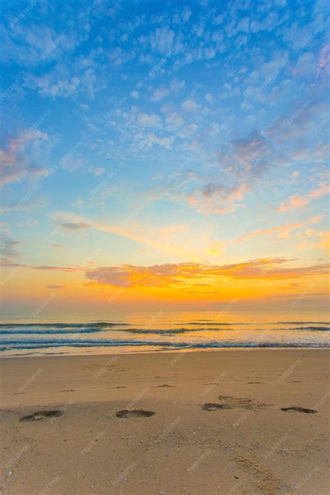 Premium Photo | The footprints were showed on the sand in sea and ...