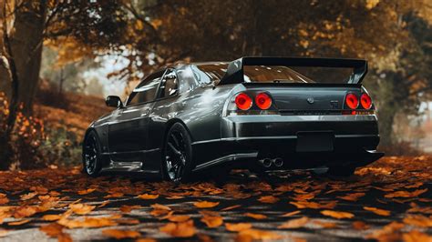 Download Gray Skyline Car In Autumn Wallpaper | Wallpapers.com