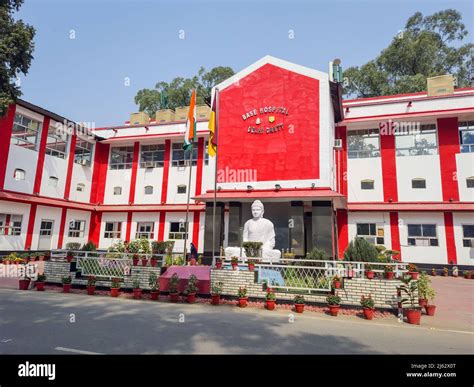 military hospital building with isolated white buddha statue at day ...