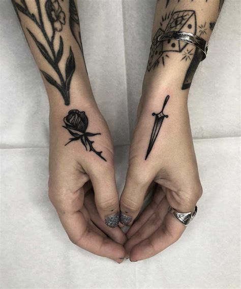 Dagger and rose by Tine DeFiore - Tattoogrid.net