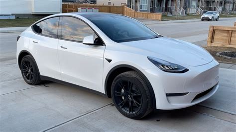 How to Turn Tesla Model Y Wheels Black - YouTube