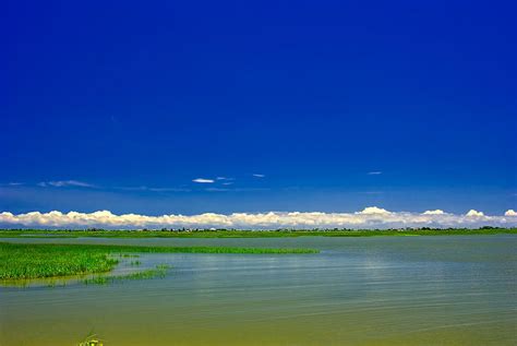 Low clouds Photograph by Robert Brown - Fine Art America