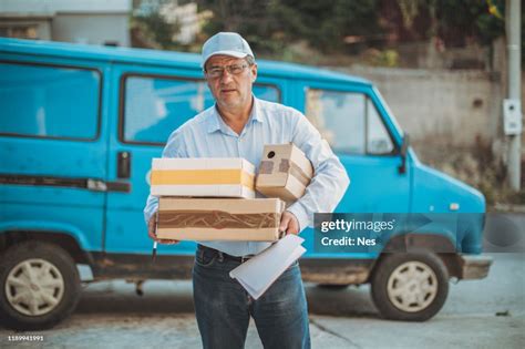 An Older Man Delivers Packages High-Res Stock Photo - Getty Images