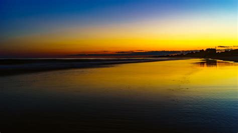 Sunset at Misquamicut Beach - Westerly, RI [OC] [6000x3375] : r/seaporn