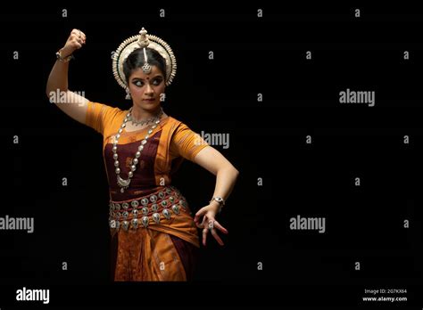 Odissi dancer performing Durga Ma mudra Stock Photo - Alamy