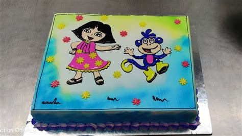 dora and buji cake....how to draw dora and buji on a cake easiest idea - YouTube