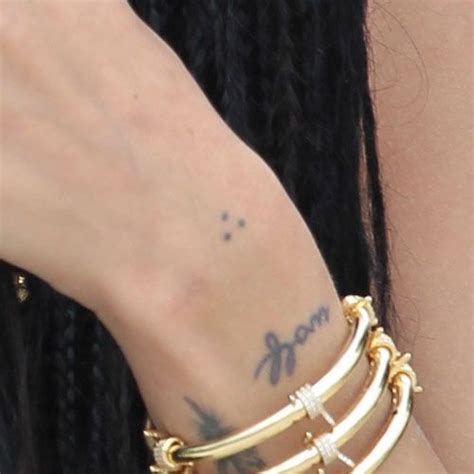 Zoë Kravitz's 39 Tattoos & Meanings | Steal Her Style | Dot tattoos, Wrist tattoos, 3 dot tattoo