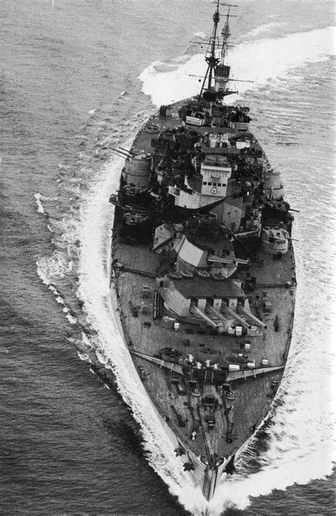 The battleship HMS Howe maneuvering in 1943. As completed she had a deep displacement of 43,337 ...