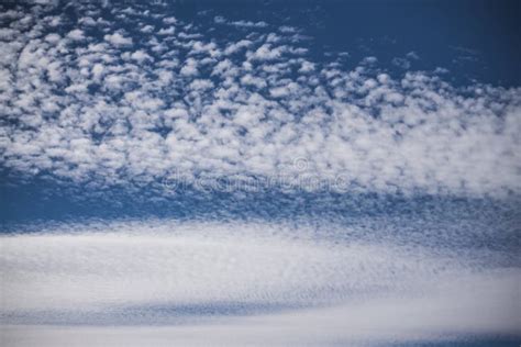 Cirrus Stratus Clouds on a Saturated Blue Sky Stock Photo - Image of wave, reflection: 261716804