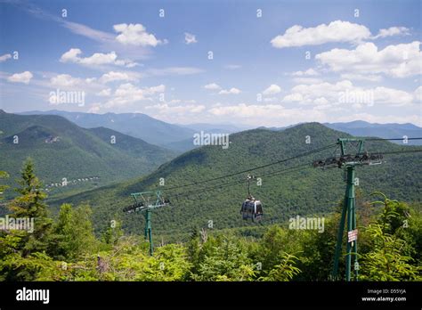 Gondola skyride at Loon Mountain Resort, NH - with mountain landscape as a background Stock ...