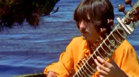 George Harrison taking sitar lessons from maestro Ravi Shankar at the Esalen Institute in Big ...