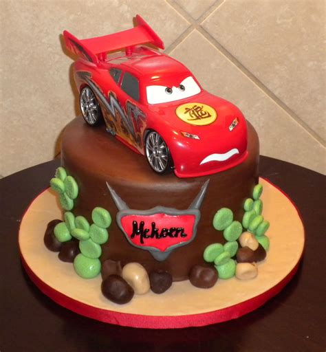 Lightning Mcqueen Birthday - like the colour of the board against the chocolate cake colour ...