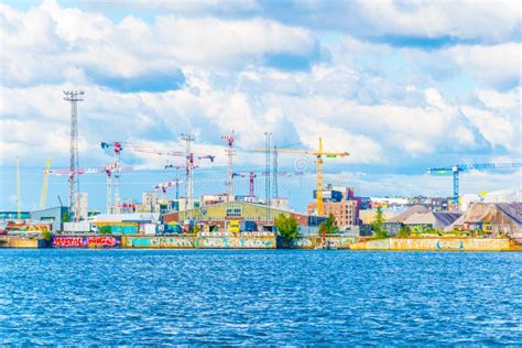 HELSINKI, FINLAND, AUGUST 17, 2016: View of a Factory Situated on Shore of the Baltic Sea in ...