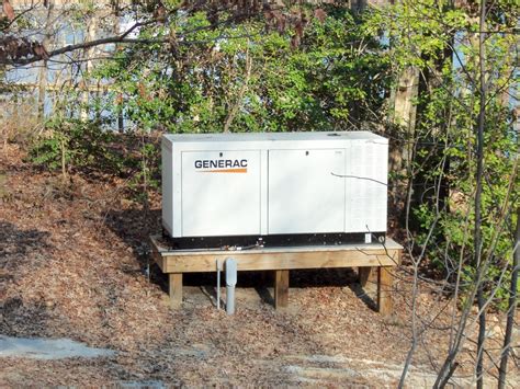 generac 70 kilowatt generator installed on a raised platform by nng ...